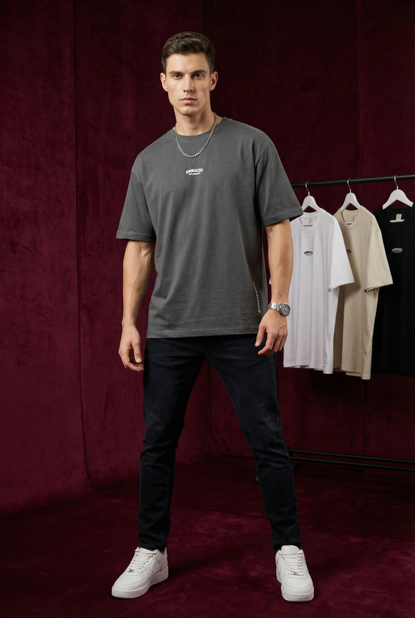 Close-up of WEARON Explore Onward Tee in White showing chest typographic mark and side 'explore onward' print.