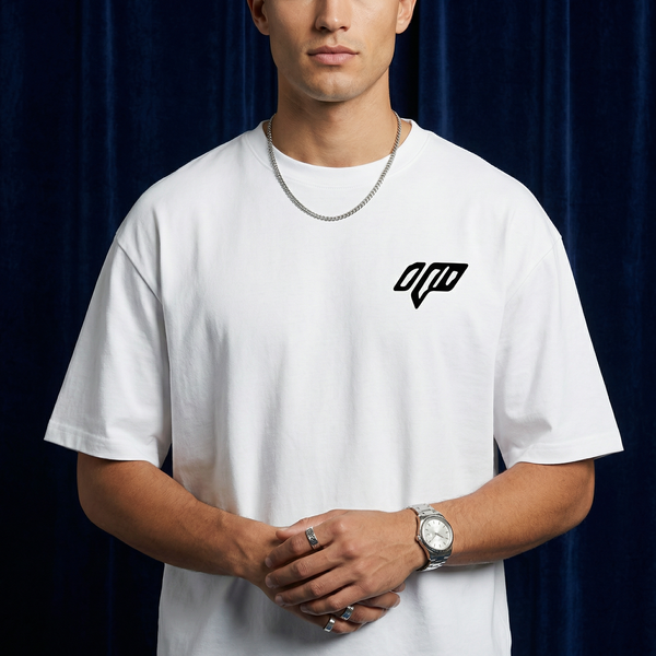 Close-up of WEARON Geometric Logo Tee in White with chest geometric emblem, deep blue velvet backdrop.