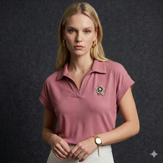 "Tailored ribbed knit top with collar in Pink, styled with casual trousers."