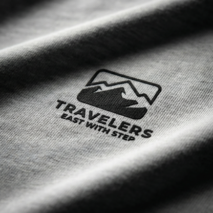 Macro detail of mountain logo print on Heather Gray cotton tee.
