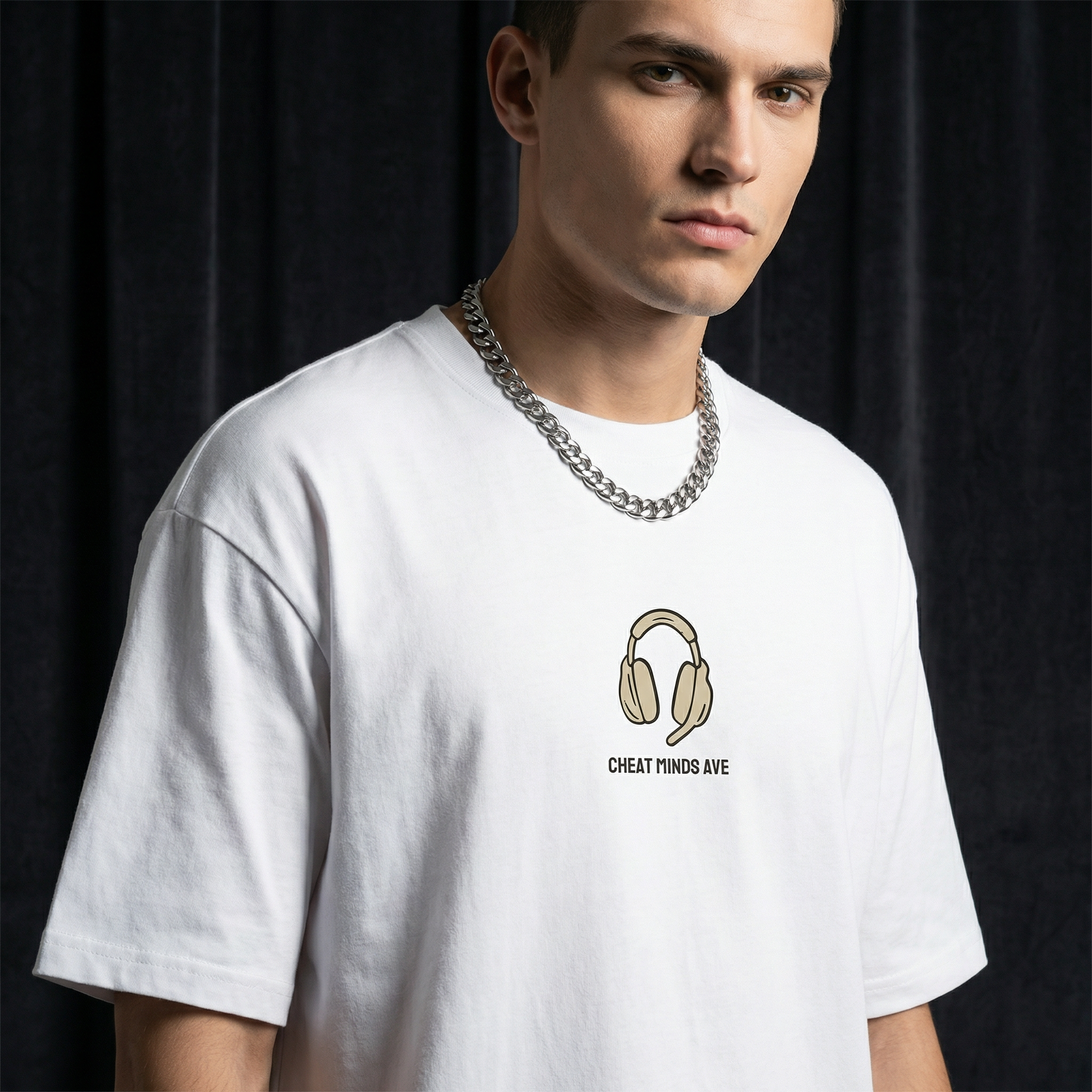 Close-up of WEARON Headphones Tee in White showing illustrated headphones chest motif.