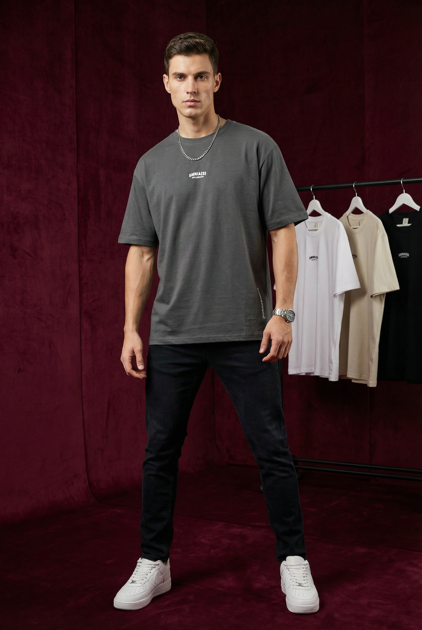 Close-up of WEARON Explore Onward Tee in White showing chest typographic mark and side 'explore onward' print.
