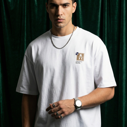 Close-up of WEARON Patch Detail Tee in Sage showing patch detail.