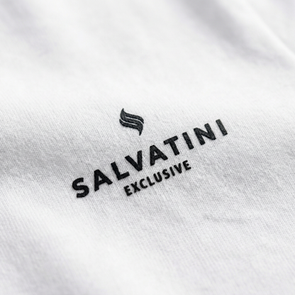 Macro detail of chest logo print on White cotton tee.