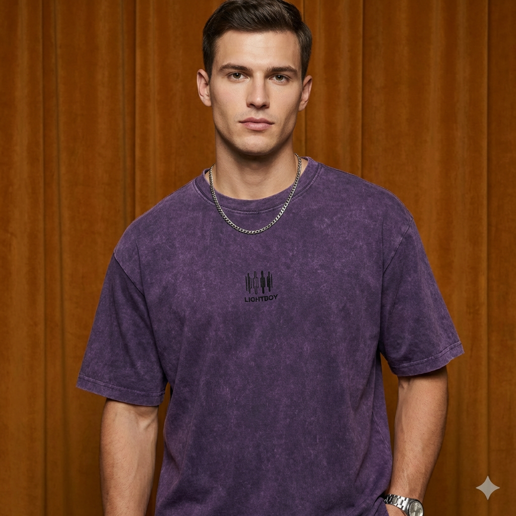 Close-up of WEARON Mineral-Wash Tee in Beige showing chest emblem and mineral-wash texture.